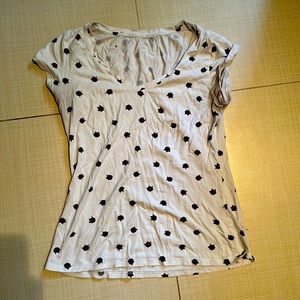 T-shirt from Simon, Twik brand. Size medium. White with roses print